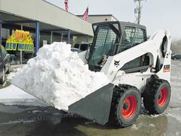 Bobcat Plowing Snow